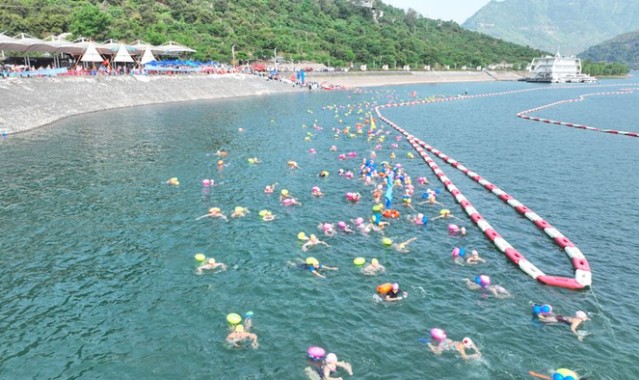 九游游戏平台-云南水富公开水域游泳邀请赛开赛|水富市|金沙江|赛事|选手|旅游_新浪新闻